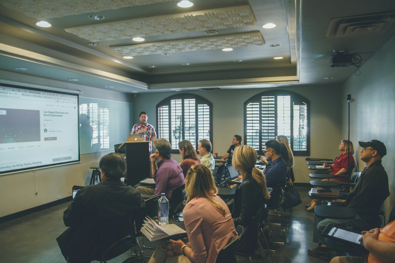 Executive cohort seated in a classroom during an AI leadership module at Nexus one-north